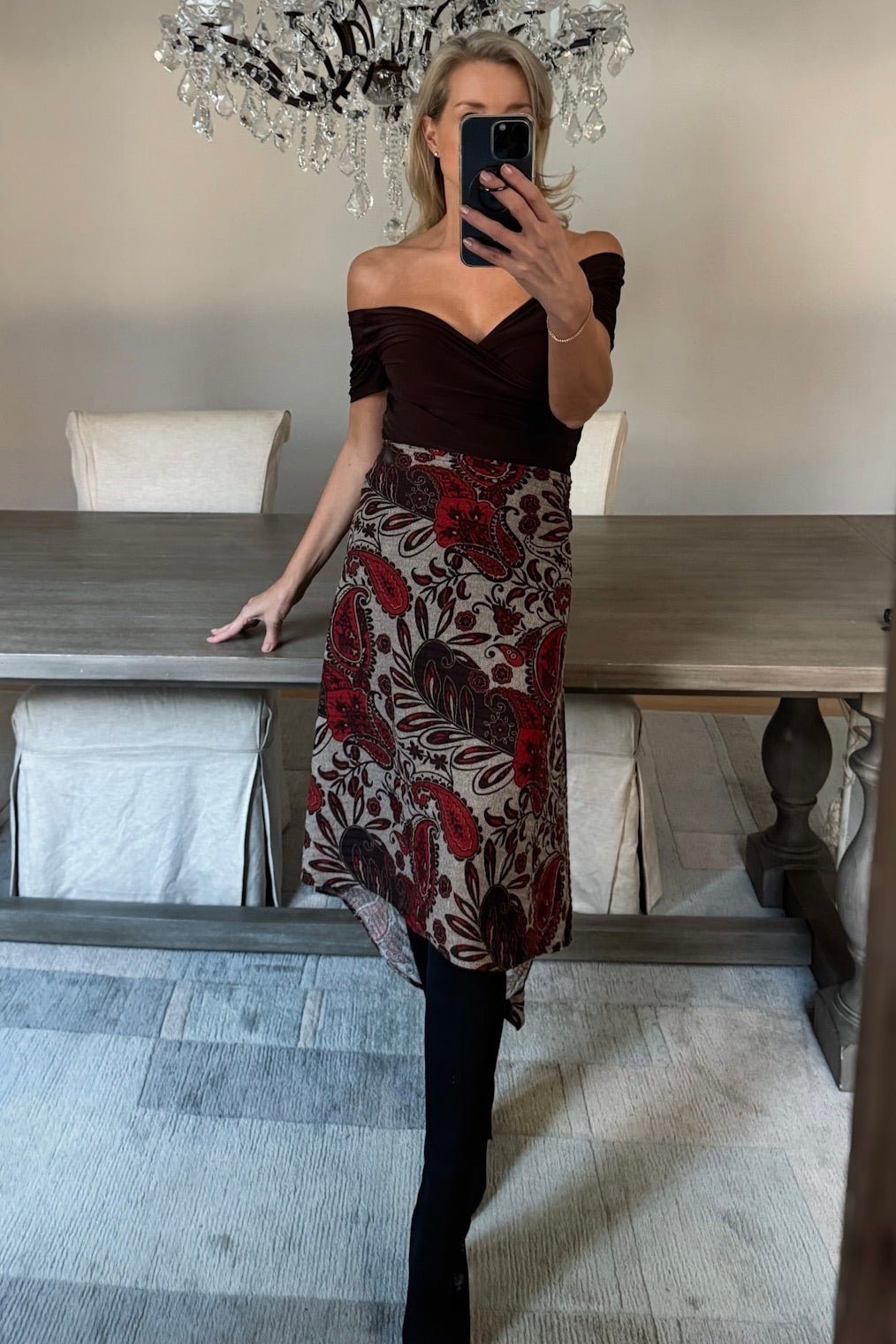 Diane Kroe Endless dress in red Spain print styled as skirt.