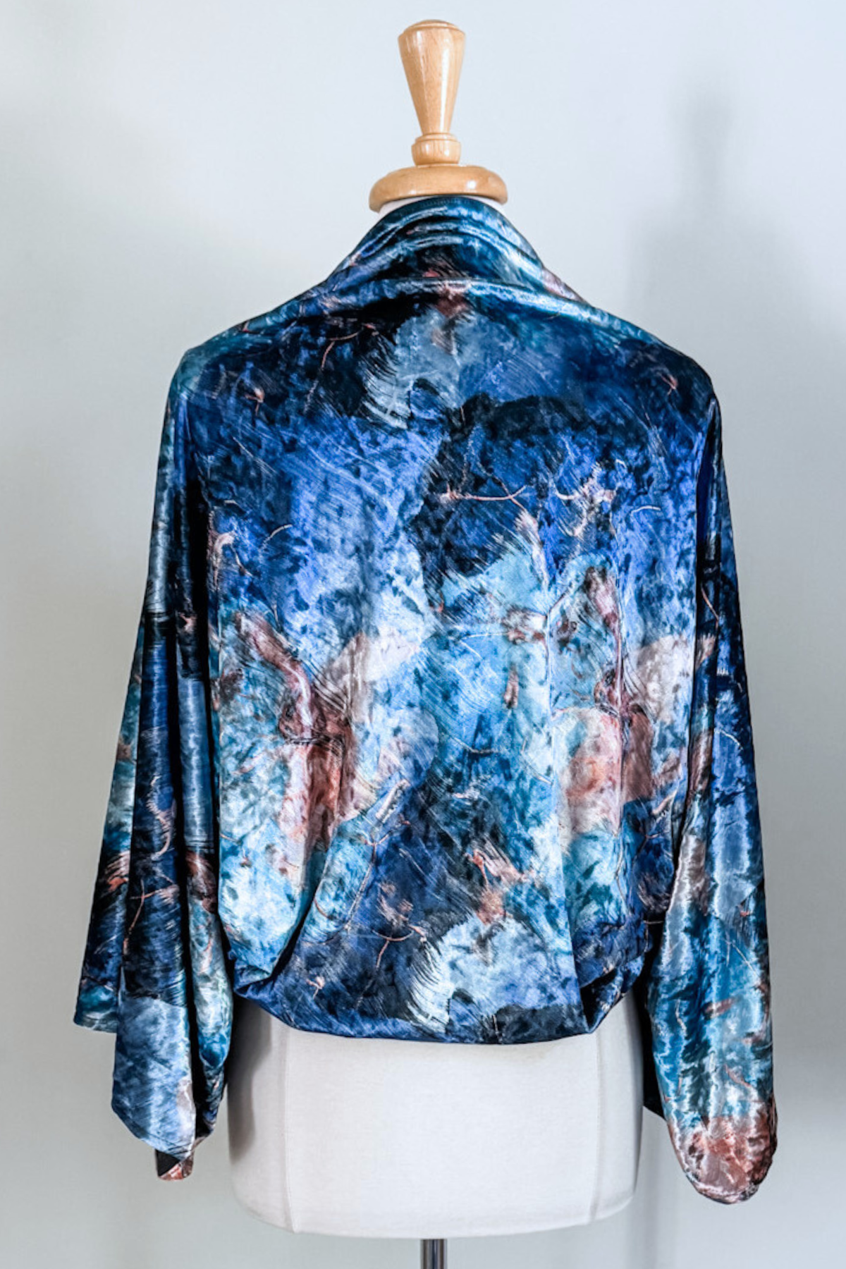 Blue Marble Velvet Carry-on Cozy— a soft, versatile velvet cardigan by Diane Kroe
