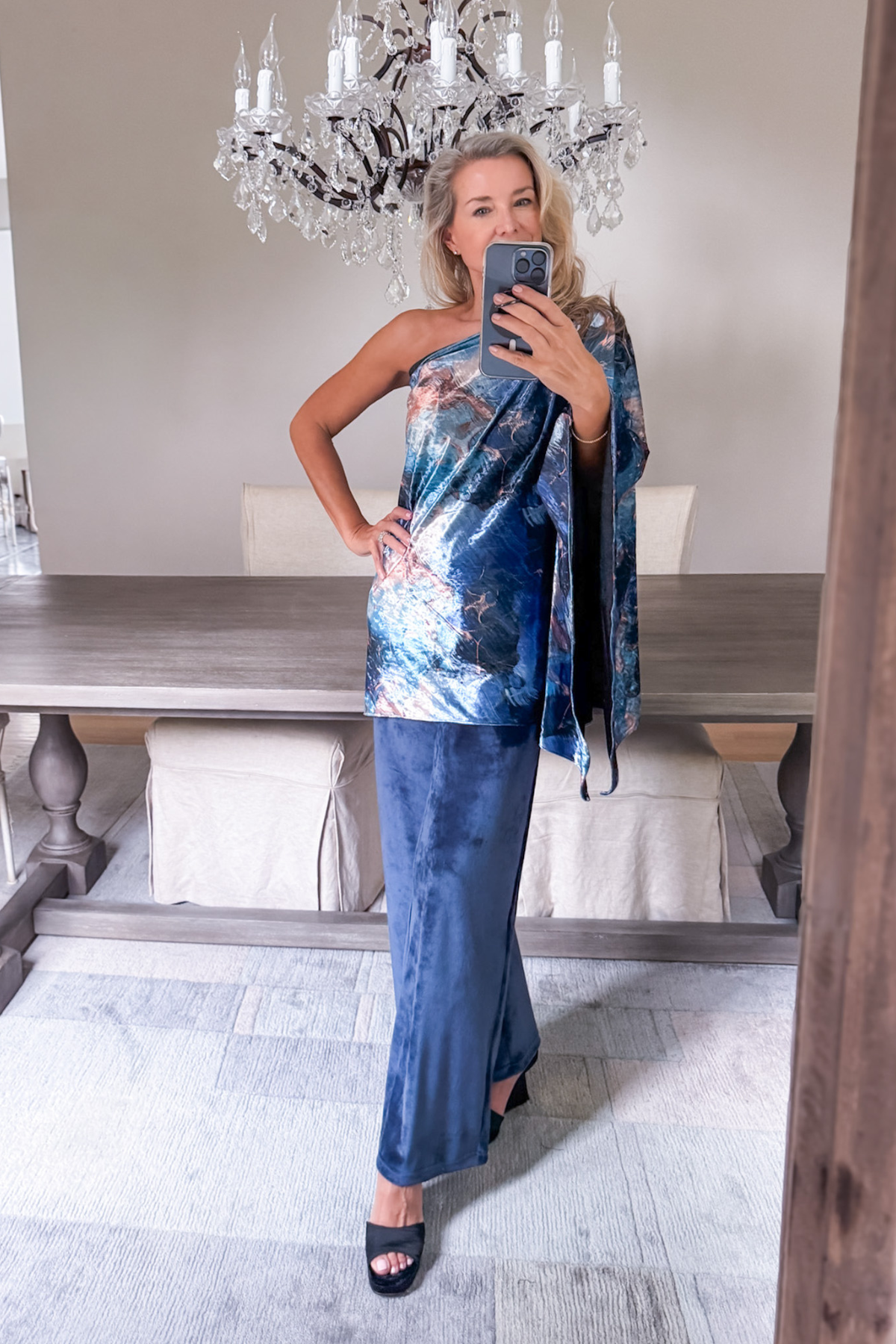 Diane Kroe wearing the Blue Marble Endless dress worn as a stylish top from the Velvet Collection