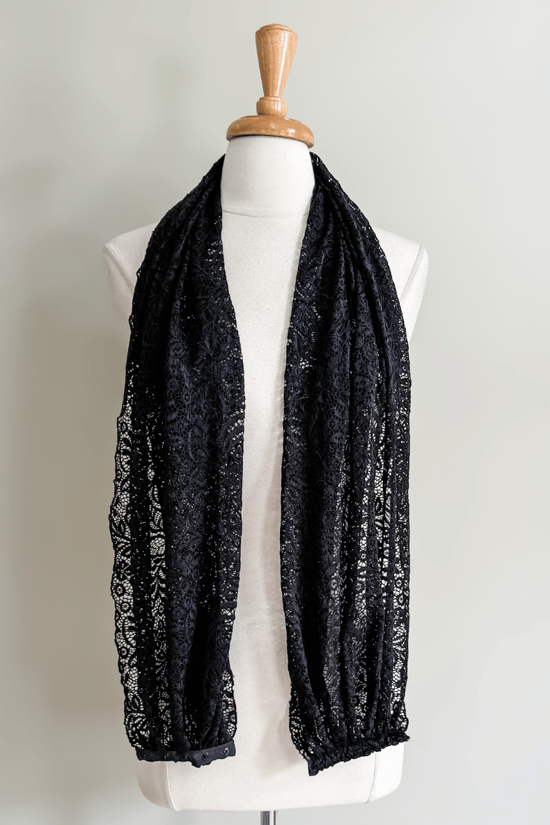 Diane Kroe Black Lace Mantilla Wrap styled as a long draped scarf.