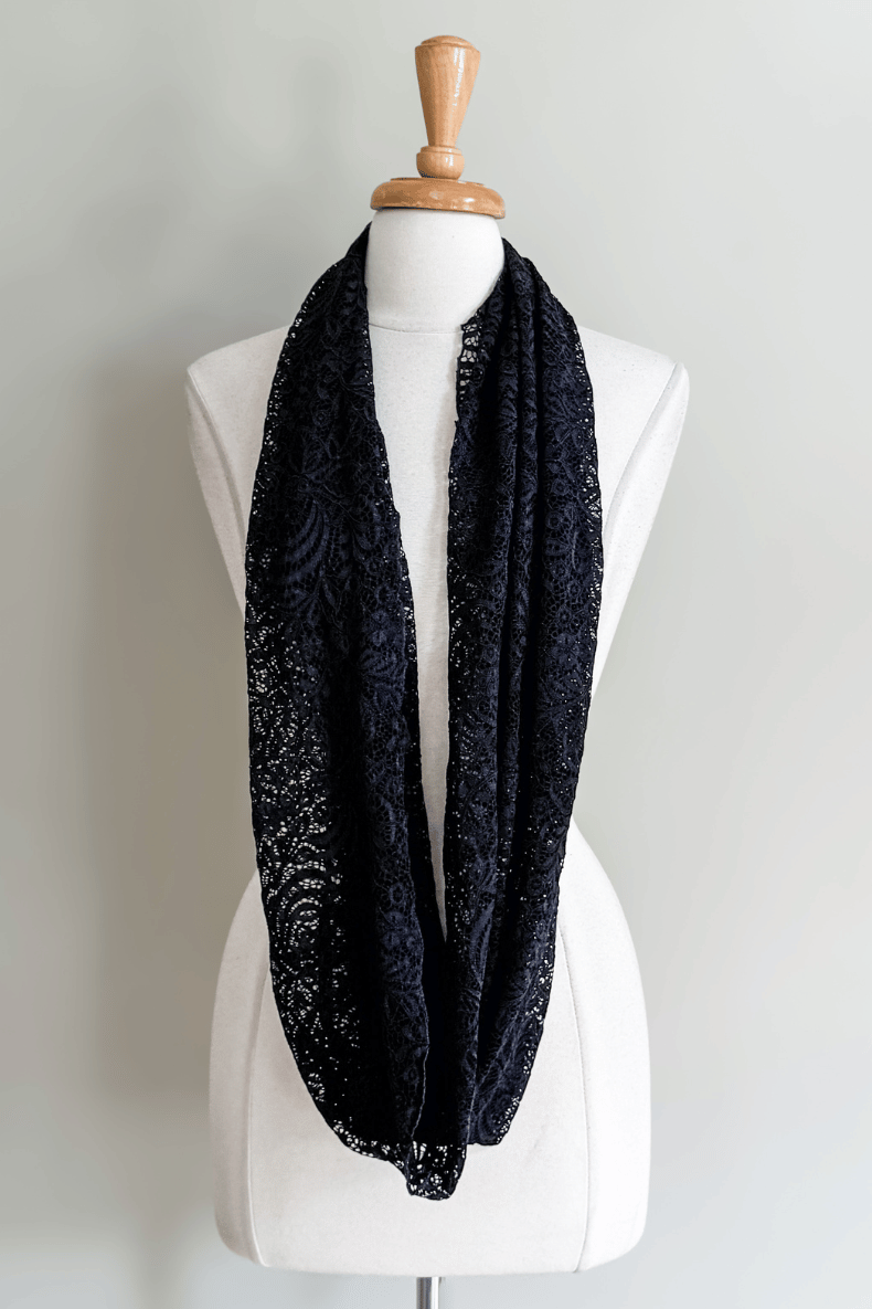 Diane Kroe Black Lace Mantilla Wrap styled as an elegant infinity scarf 