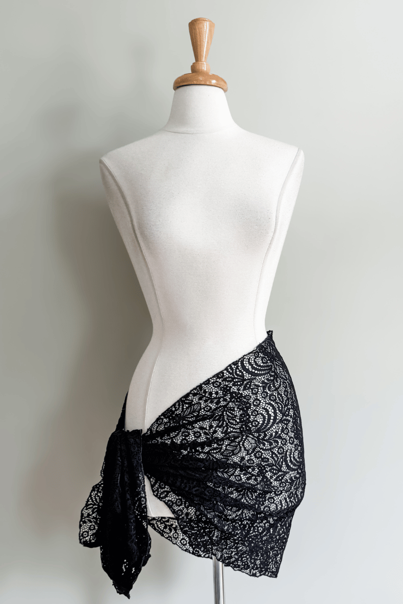 Diane Kroe Black Lace Mantilla Wrap styled as a chic side-tied skirt