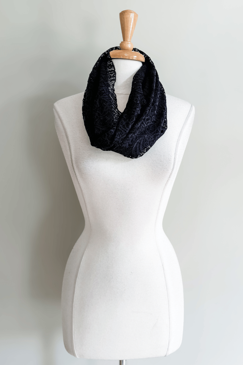Diane Kroe Black Lace Mantilla Wrap styled as a cozy infinity cowl scarf