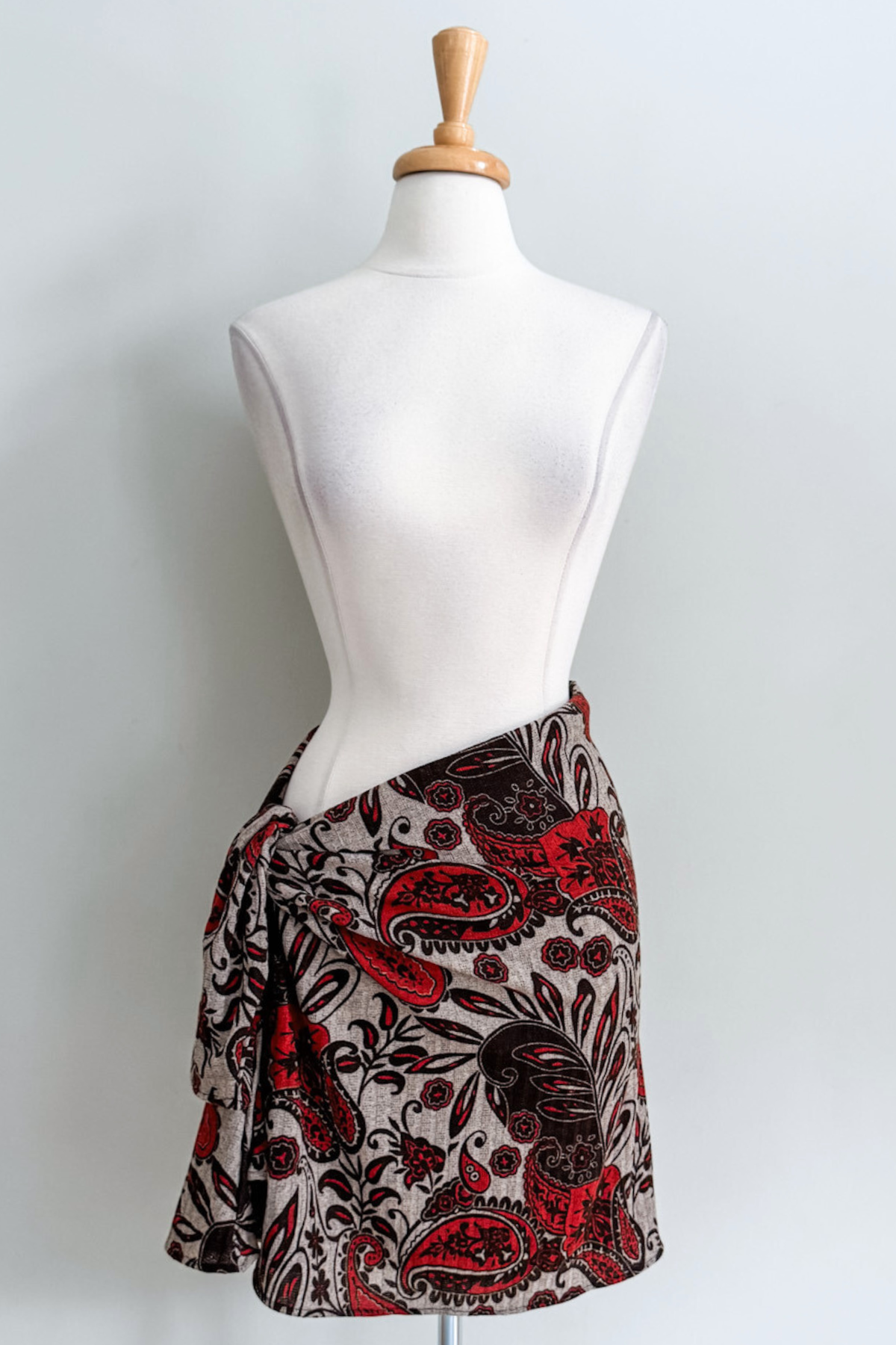 Diane Kroe Wanderlust wrap in red Spain print styled as a skirt.