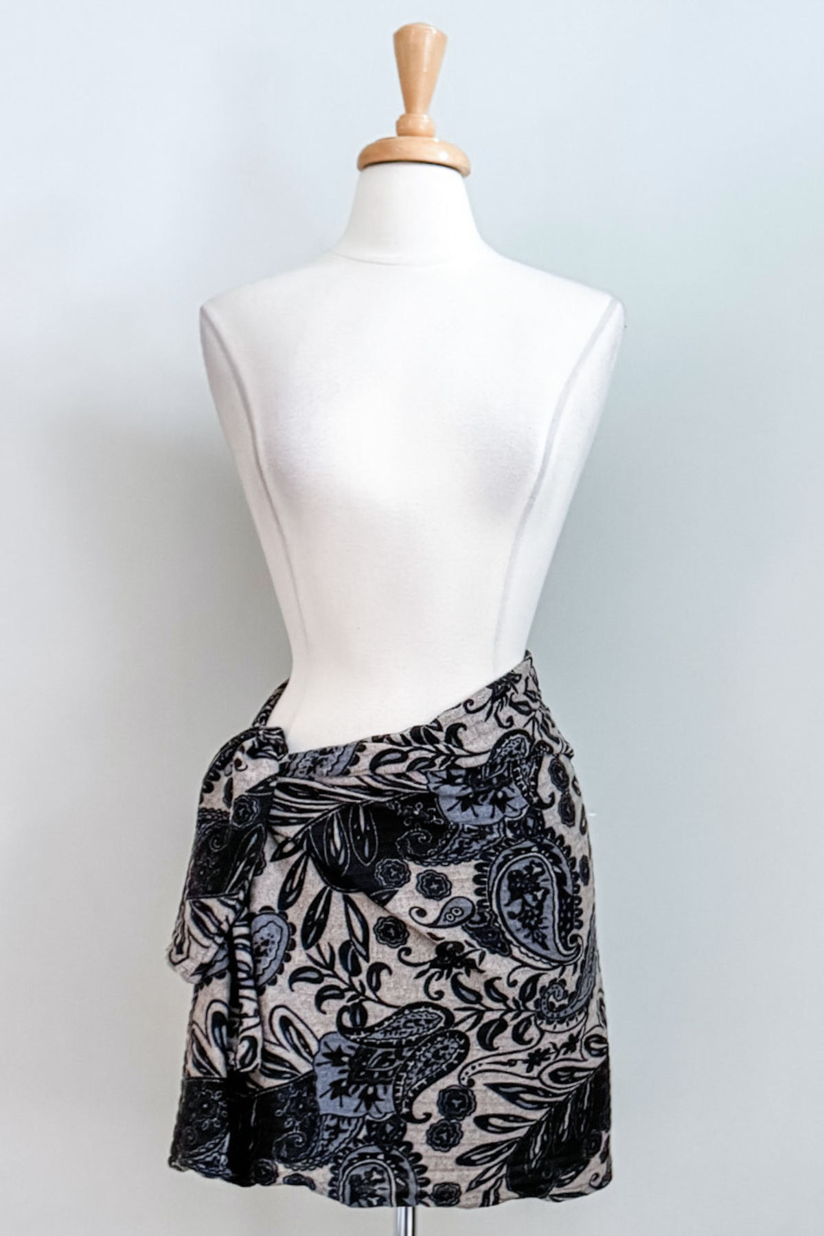 Diane Kroe Wanderlust wrap in blue Spain print styled as a skirt.