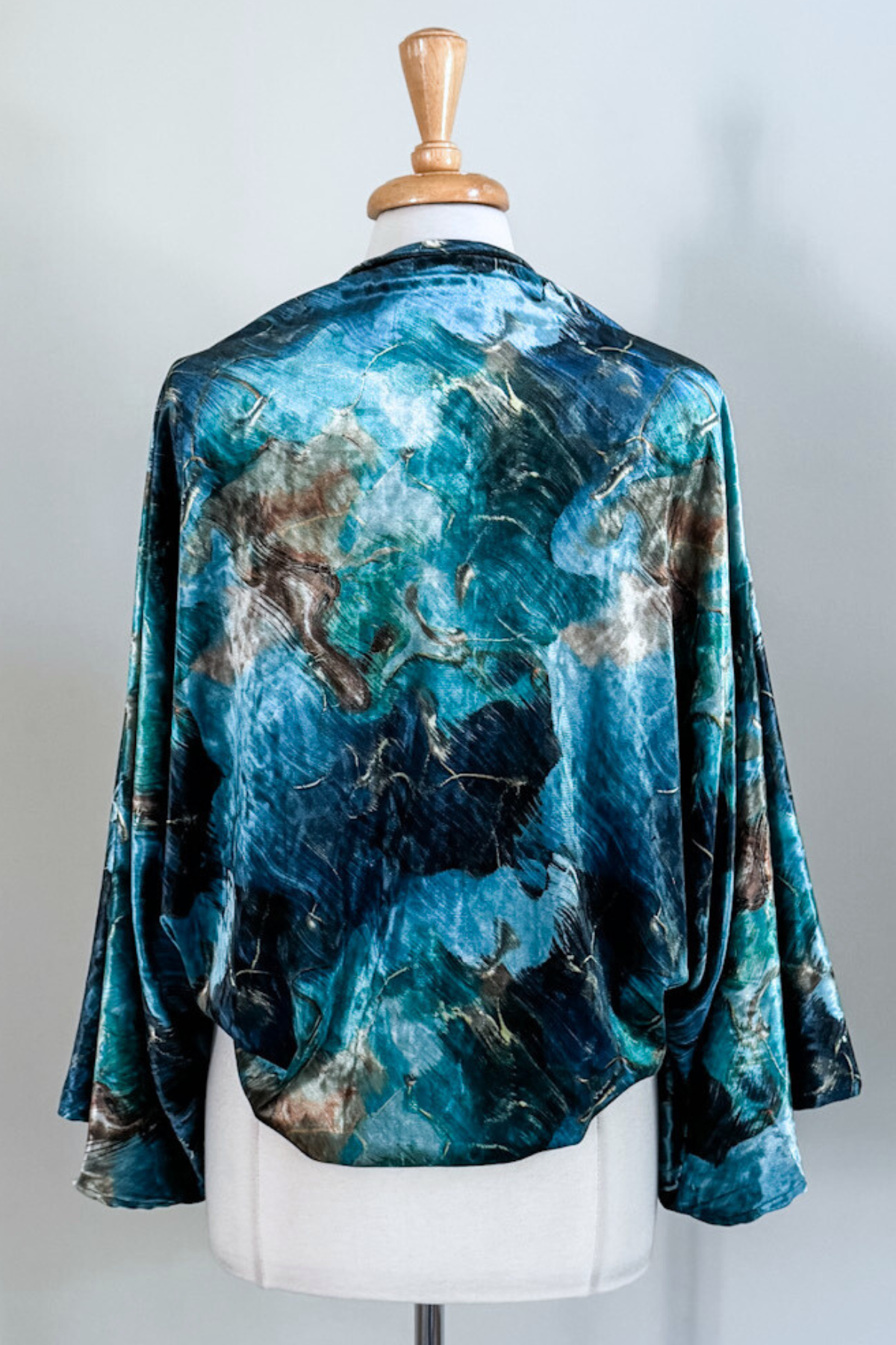 Turquoise Marble Velvet Carry-on Cozy— a soft, versatile velvet cardigan by Diane Kroe 